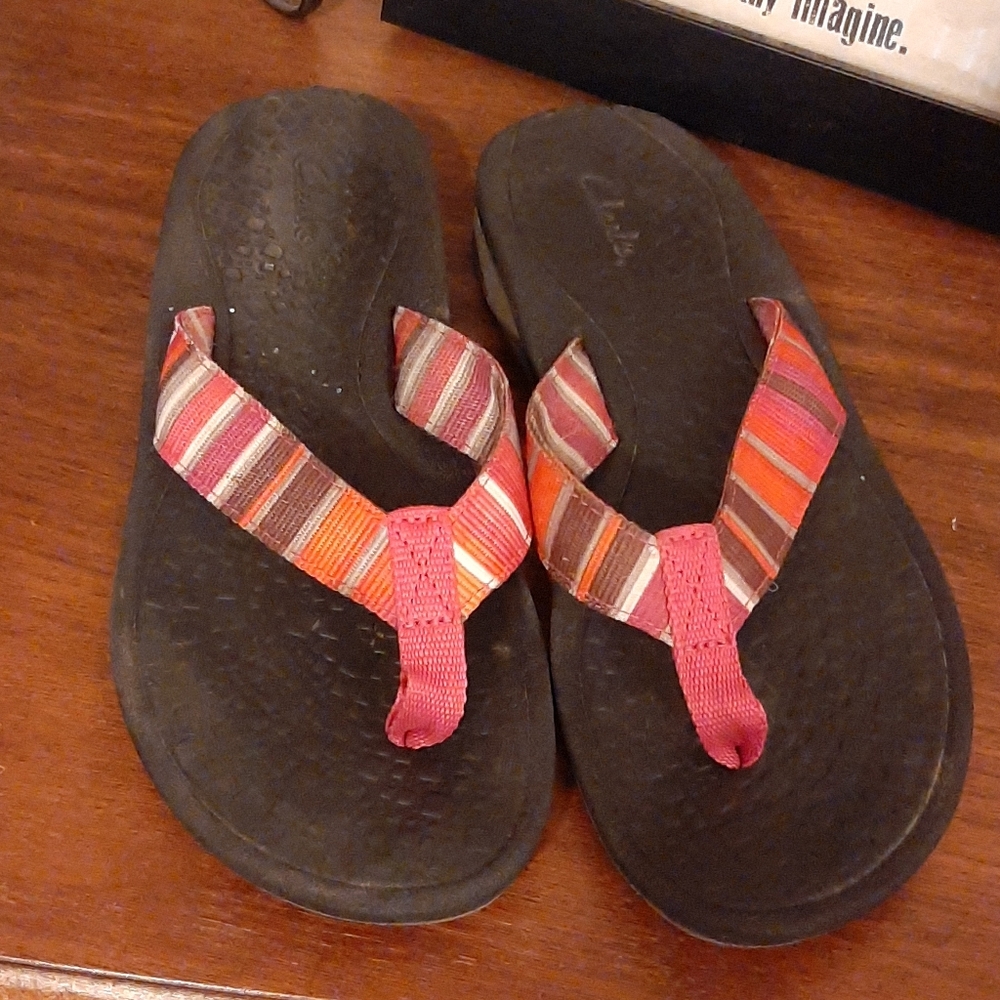 Clark's orange and pink flip flops Size 7M